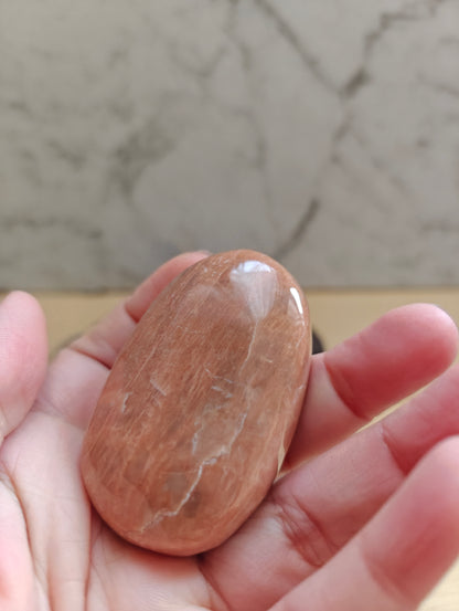 Peach Moonstone Palm Stone